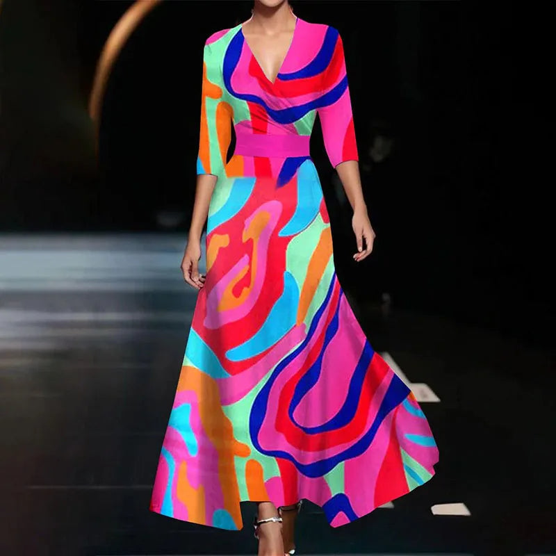 SUNA Cassidy Elegant Blomsterprint Maxikjole Flatterende Talje Farverig