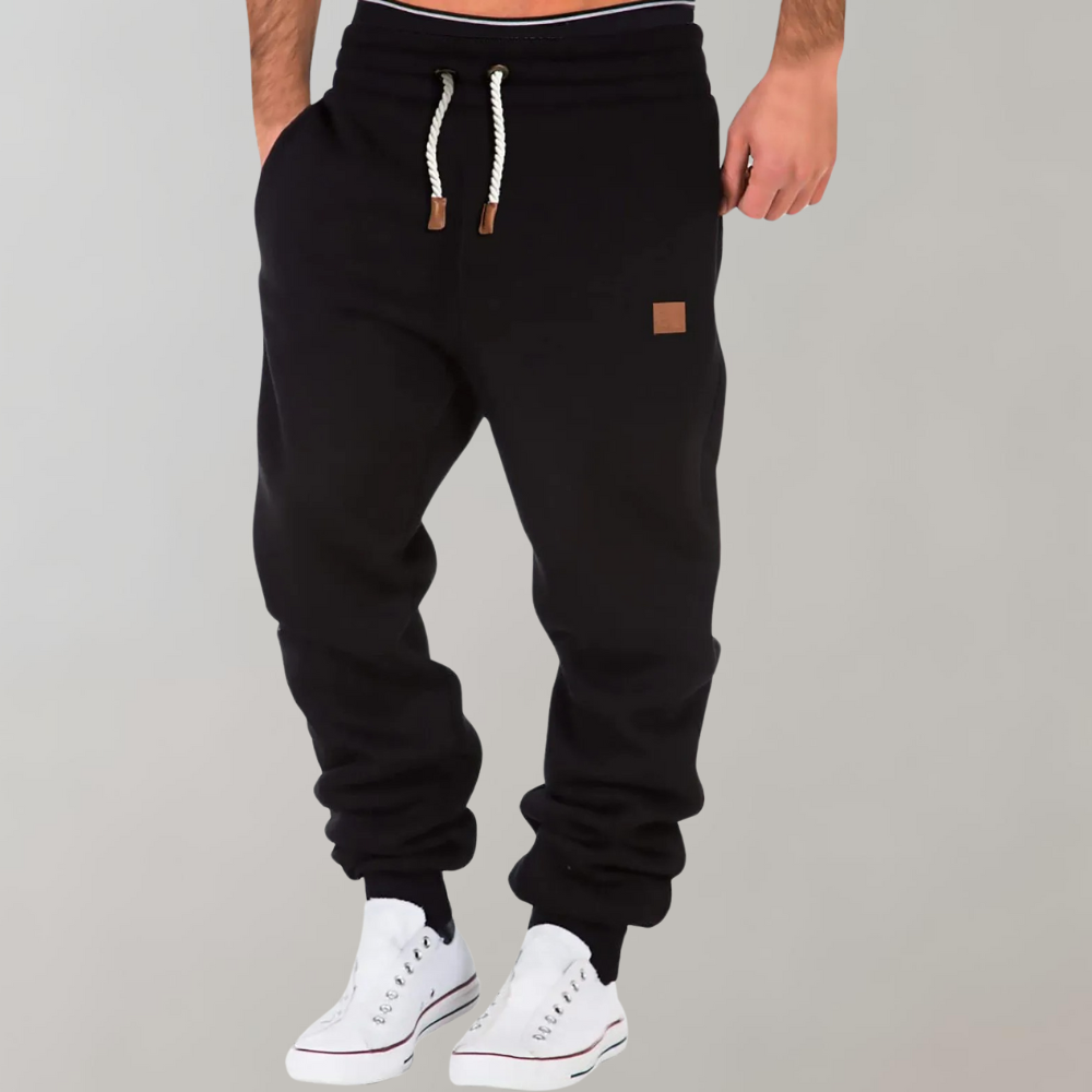 SUNA Hoder - Joggingbukser til Herrer i Komfortabel Baggy Stil Sort